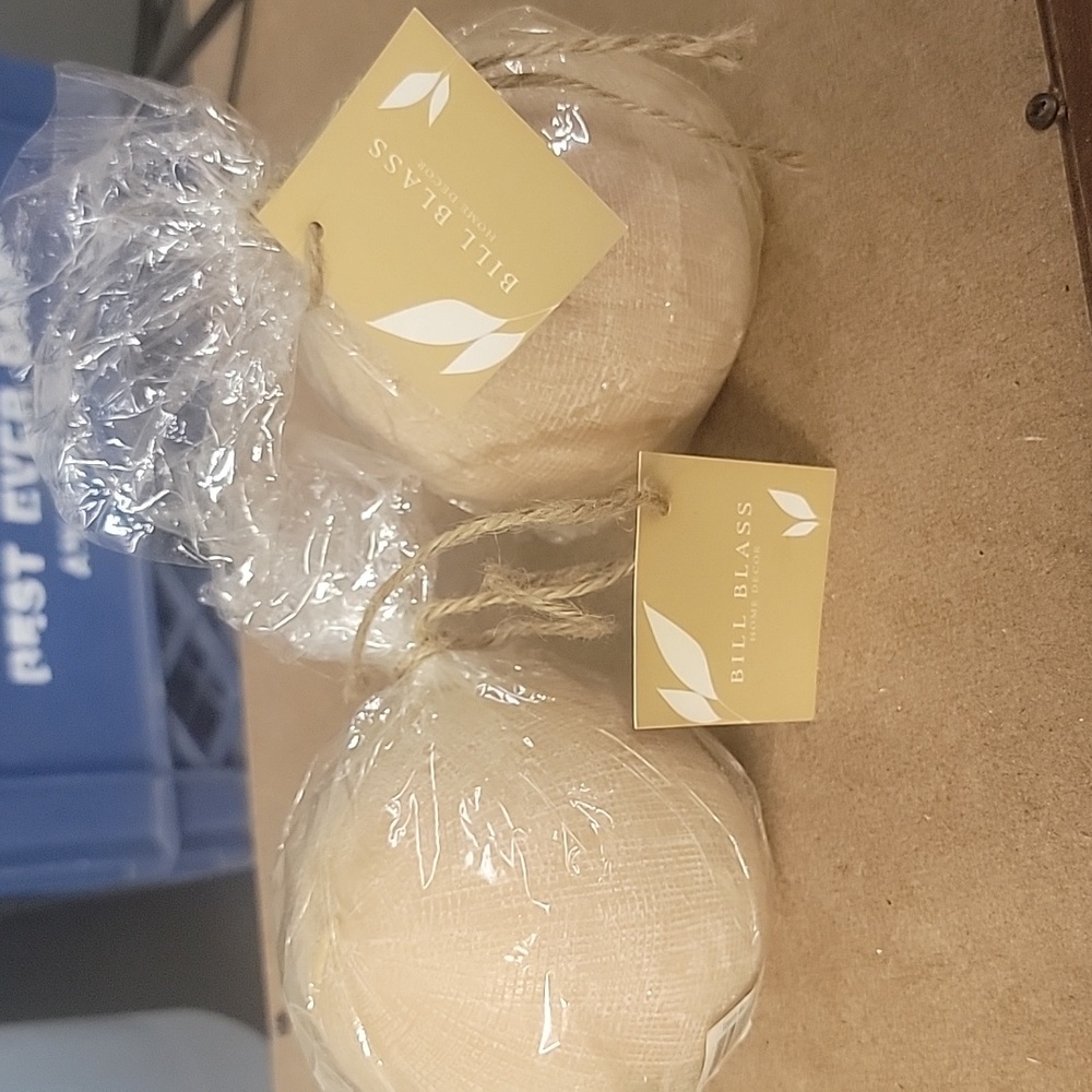 Set of two "bill blass" orb decor candles